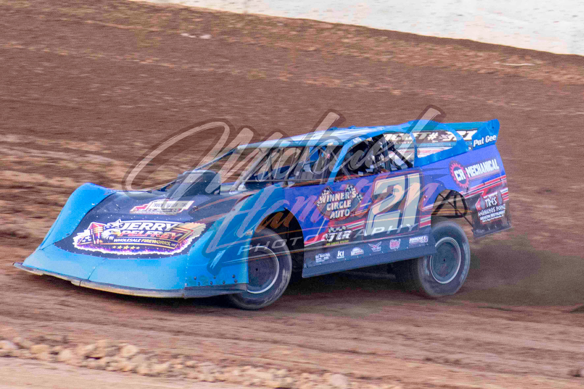 Blue dirt late model in action